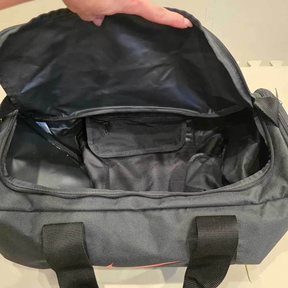 NWT Nike black duffel bag with the BHM1 logo